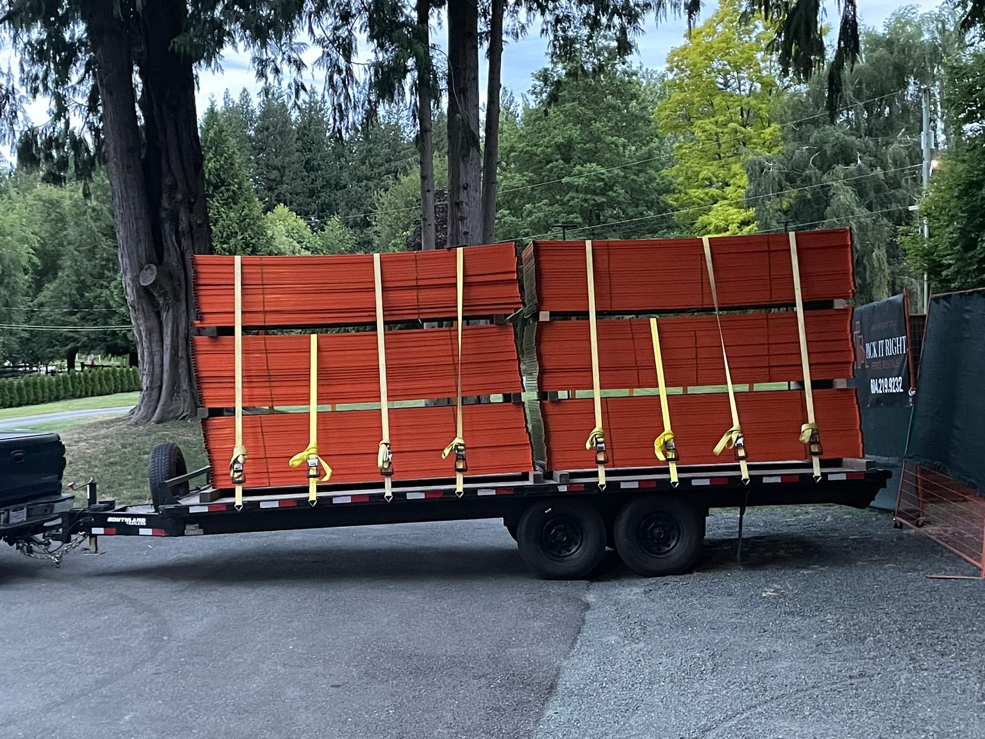 Heavy-duty fence panels on delivery trailer