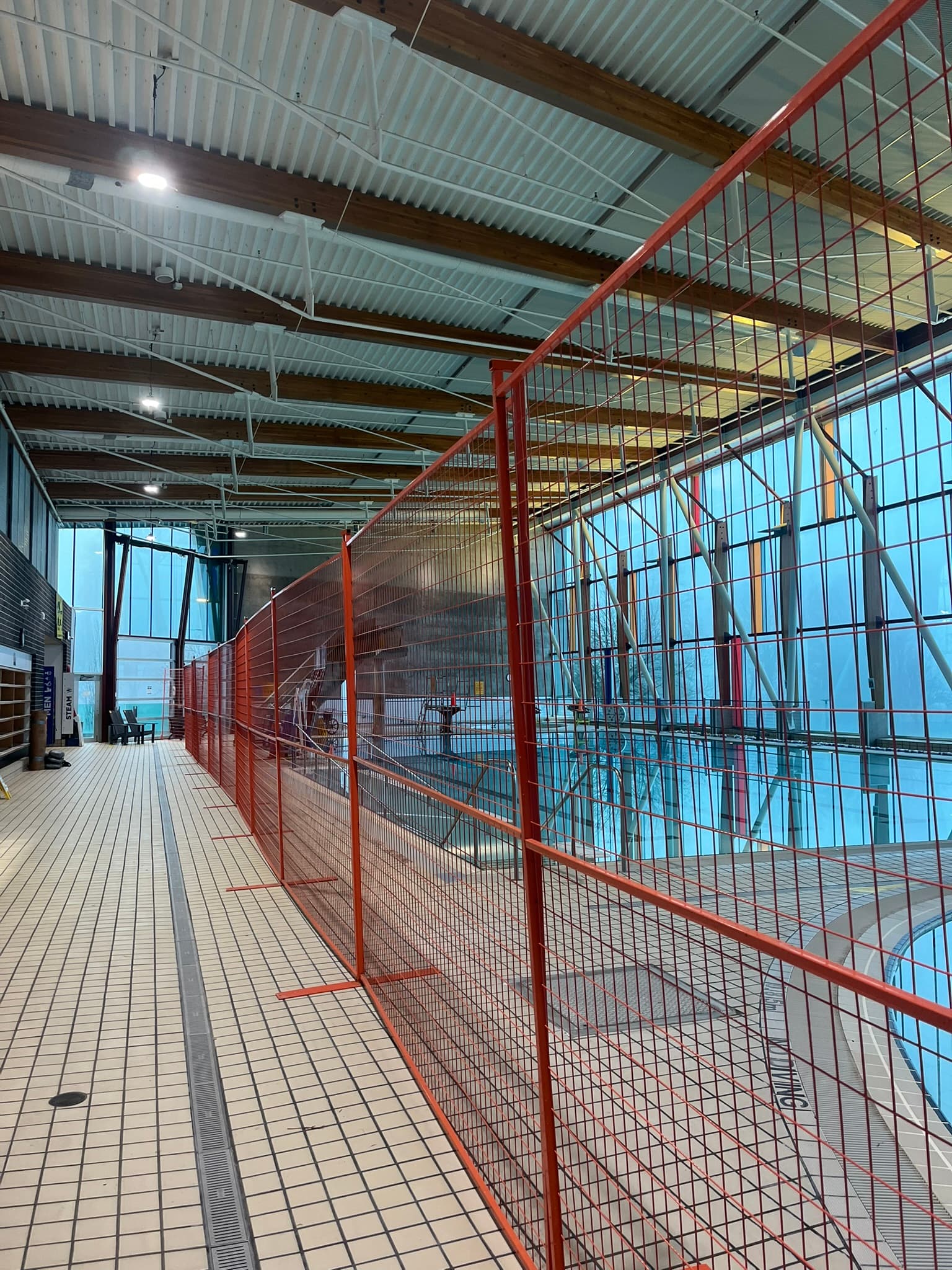 Temporary fencing securing an indoor renovation area